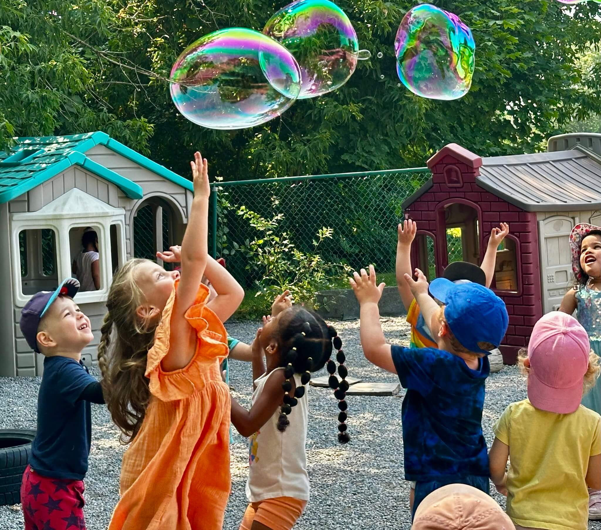 kids playing with bubbles